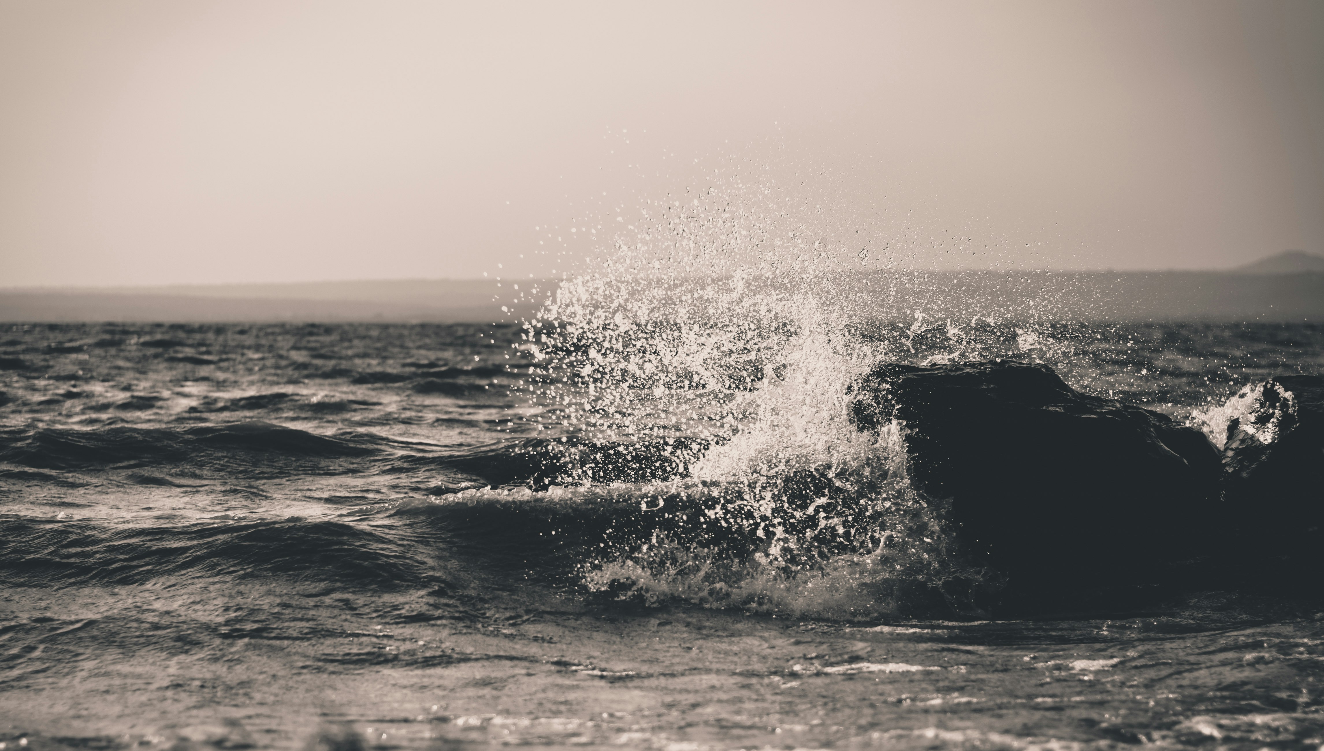 grayscale photography of water waves